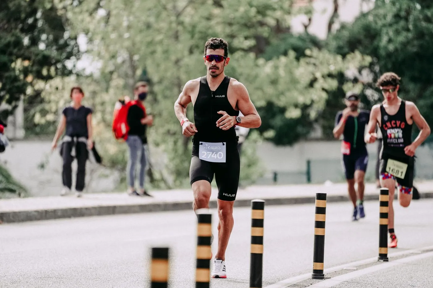 Man running on a road during a race