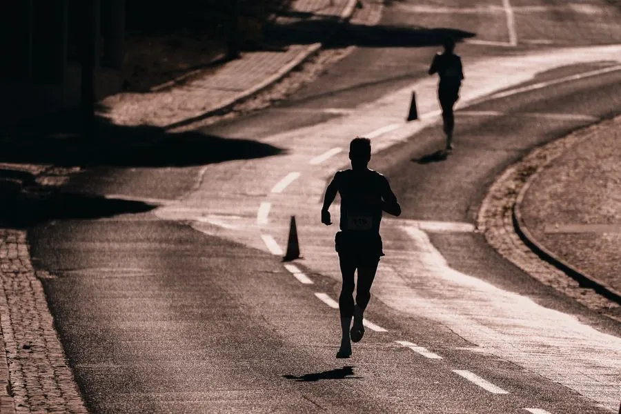 Runner silhouette on a street