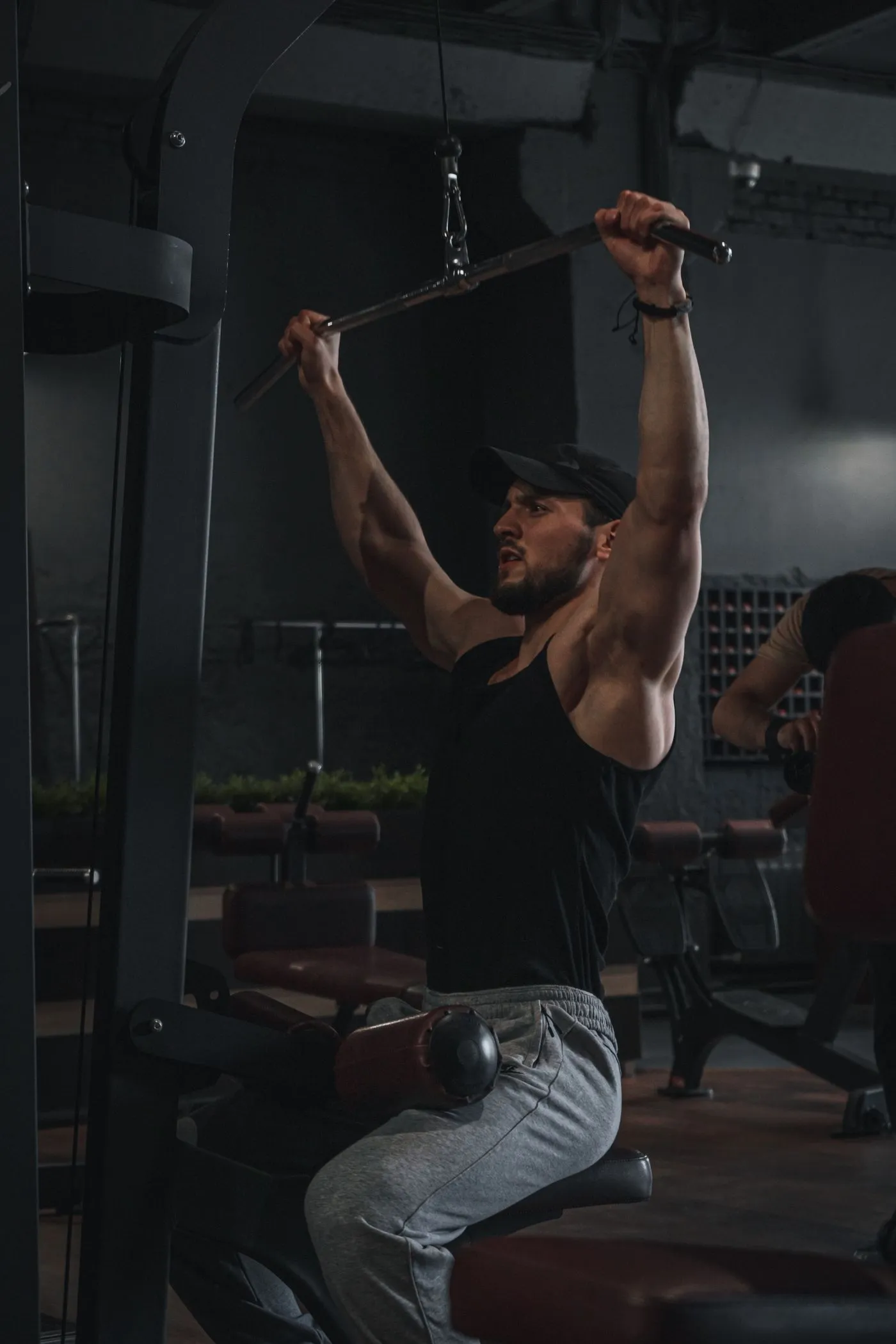 Man training with weights in a gym