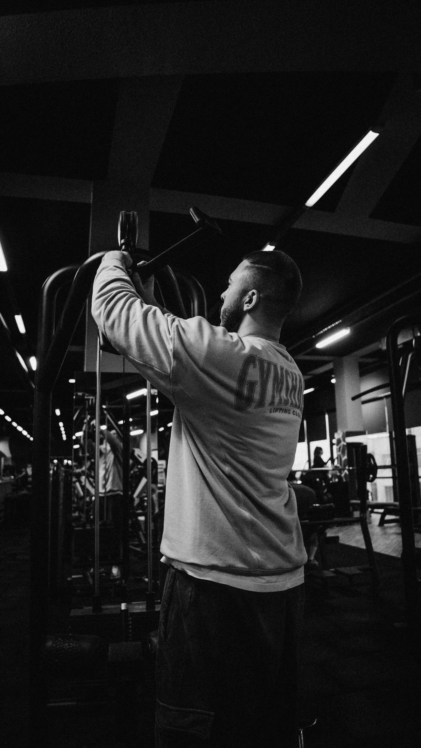 Man training in dramatic low light